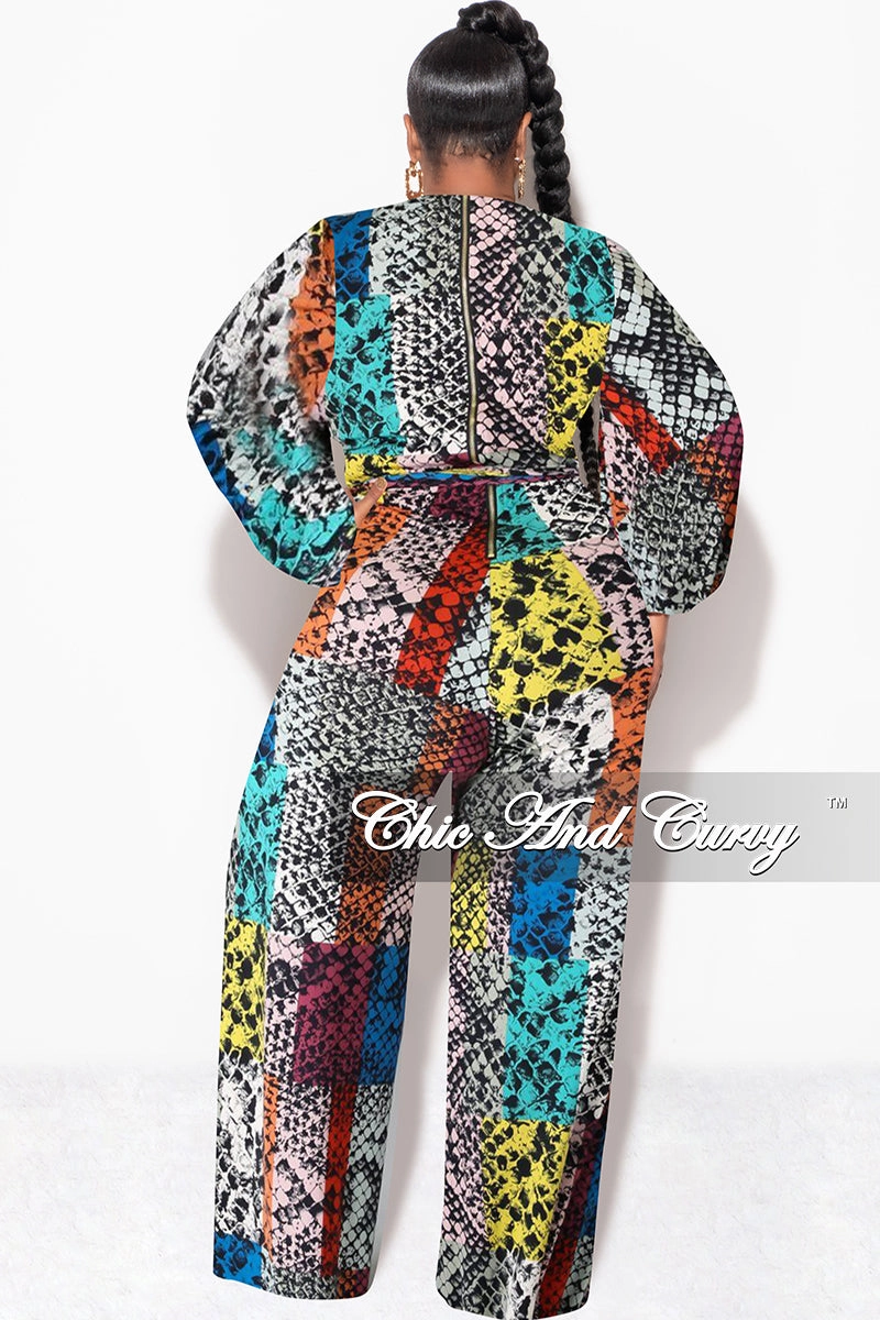 Wide-leg cut Final Sale Plus Size Long Sleeve Faux Wrap Jumpsuit with Attached Tie in Multi-Color Print