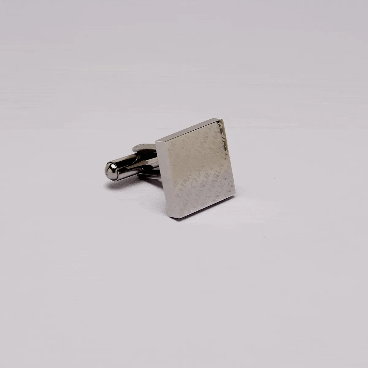 Engraved Diagonal Striped Silver Cuffs
