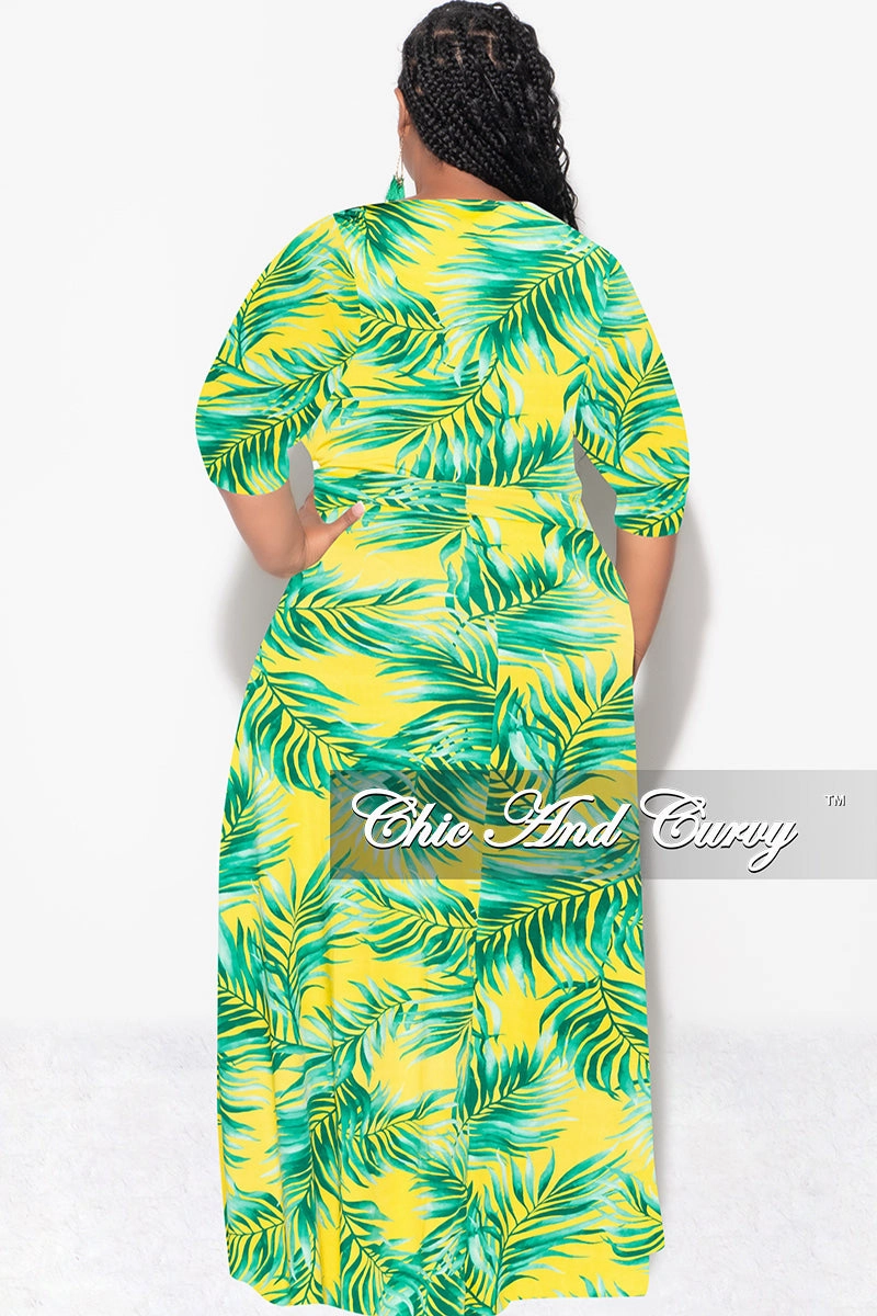 Movement Flex Four Way Stretch Final Sale Plus Size Faux Wrap Dress in Yellow and Green Palm Print