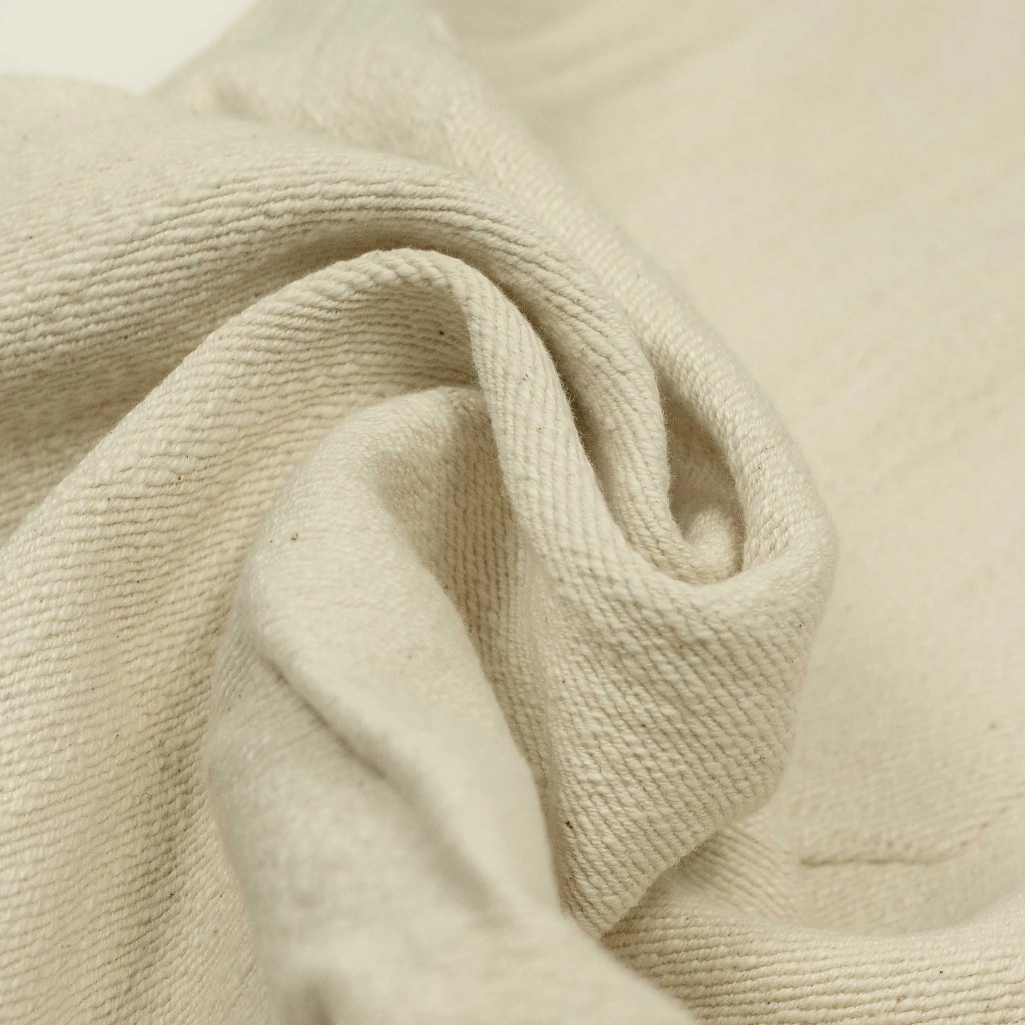 Flat front trousers in natural slubby handwoven cotton denim