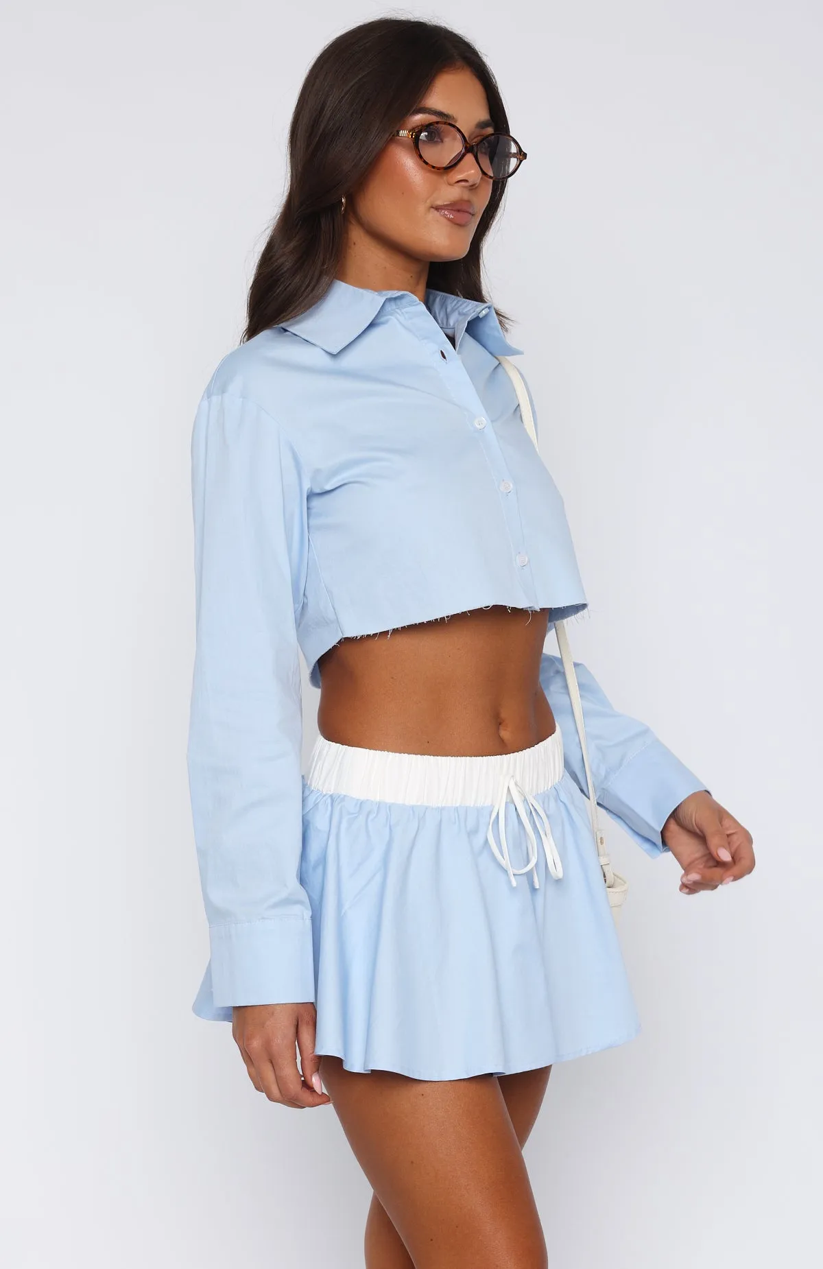 ArticulatedElbowShaping Getting Out Of Hand Cropped Shirt Blue