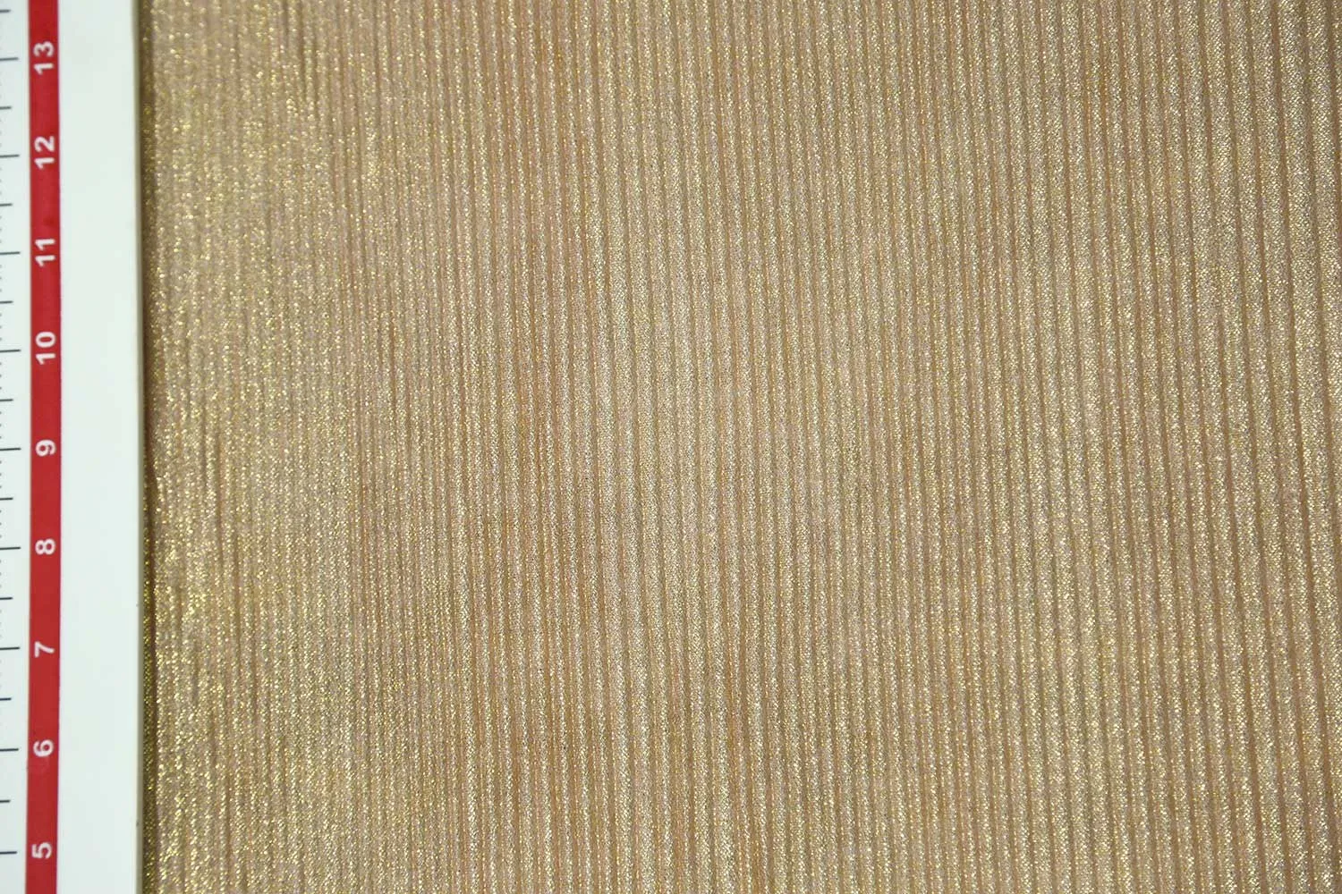 Golden Foil on Peach Pleated Foil Knit Fabric