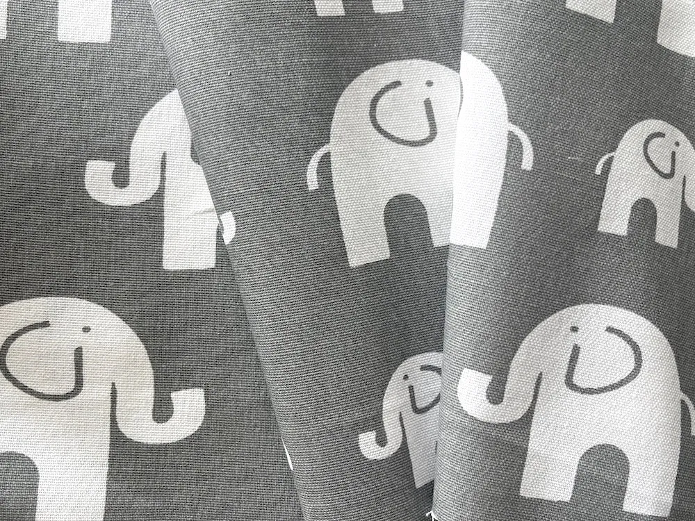Lighter-Weight White Elephant Herd on Pigeon Grey Cotton Canvas (Made in USA)