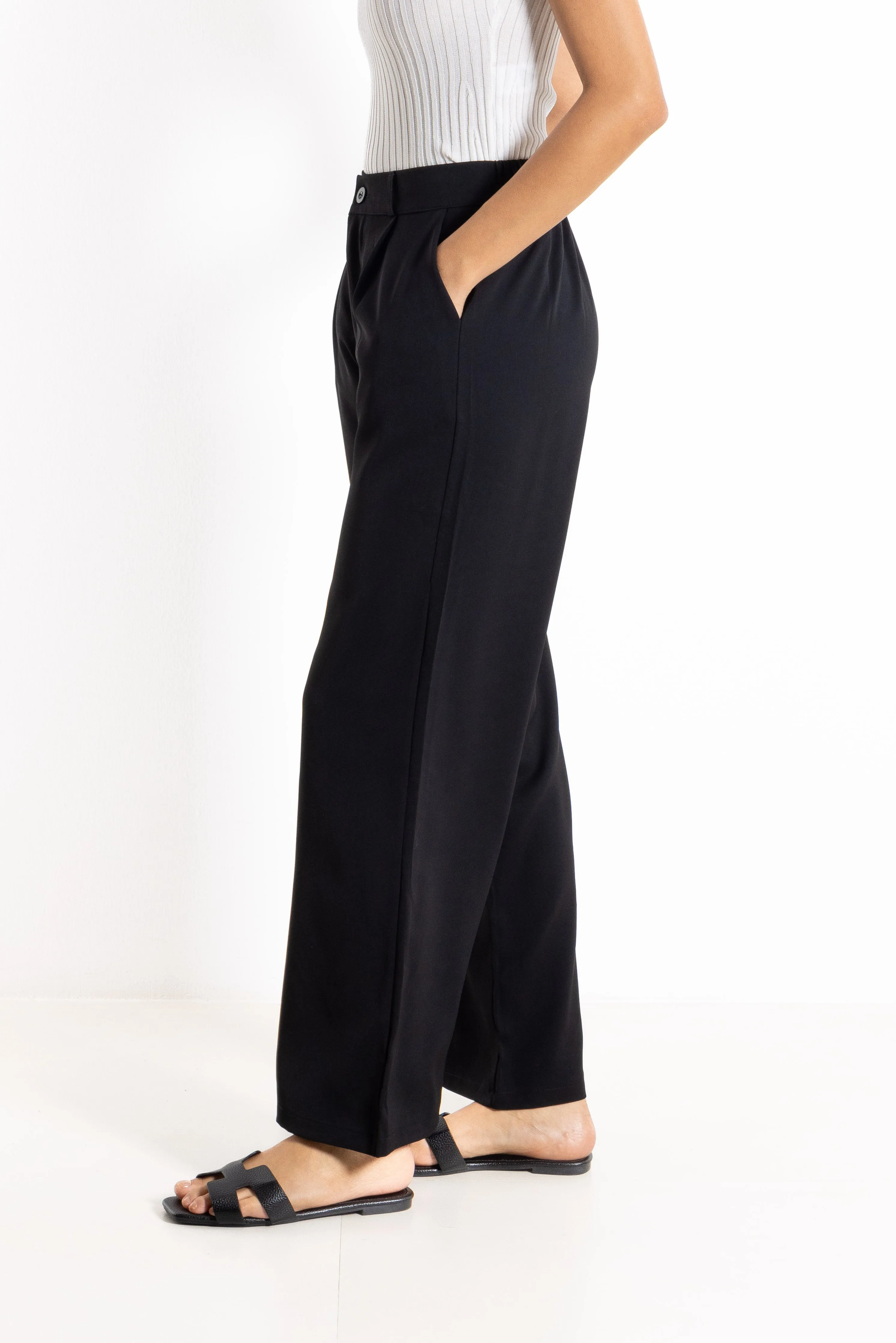 PLEATED HIGH-WAIST TROUSERS
