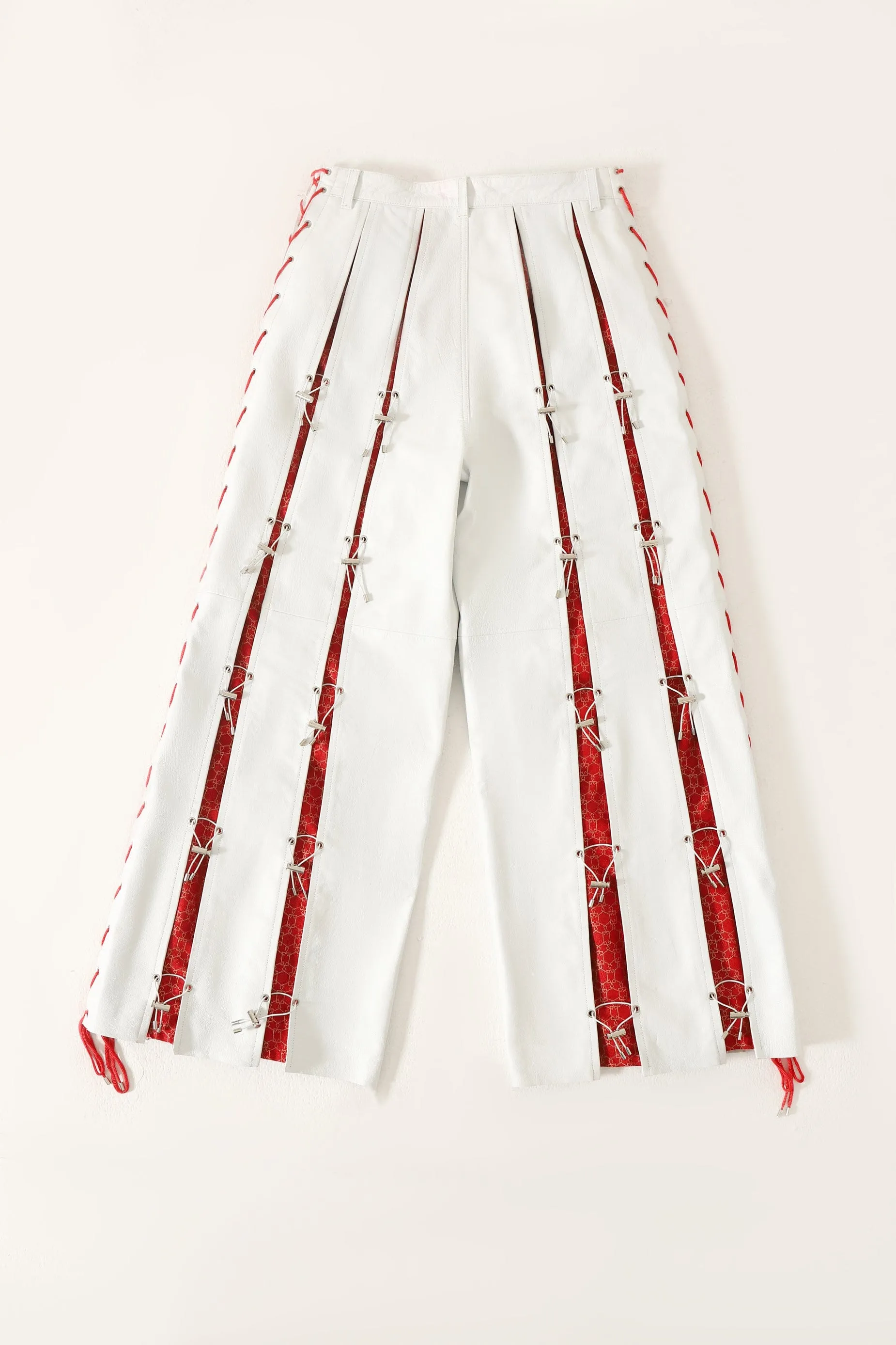 PLEATED LEATHER TROUSERS