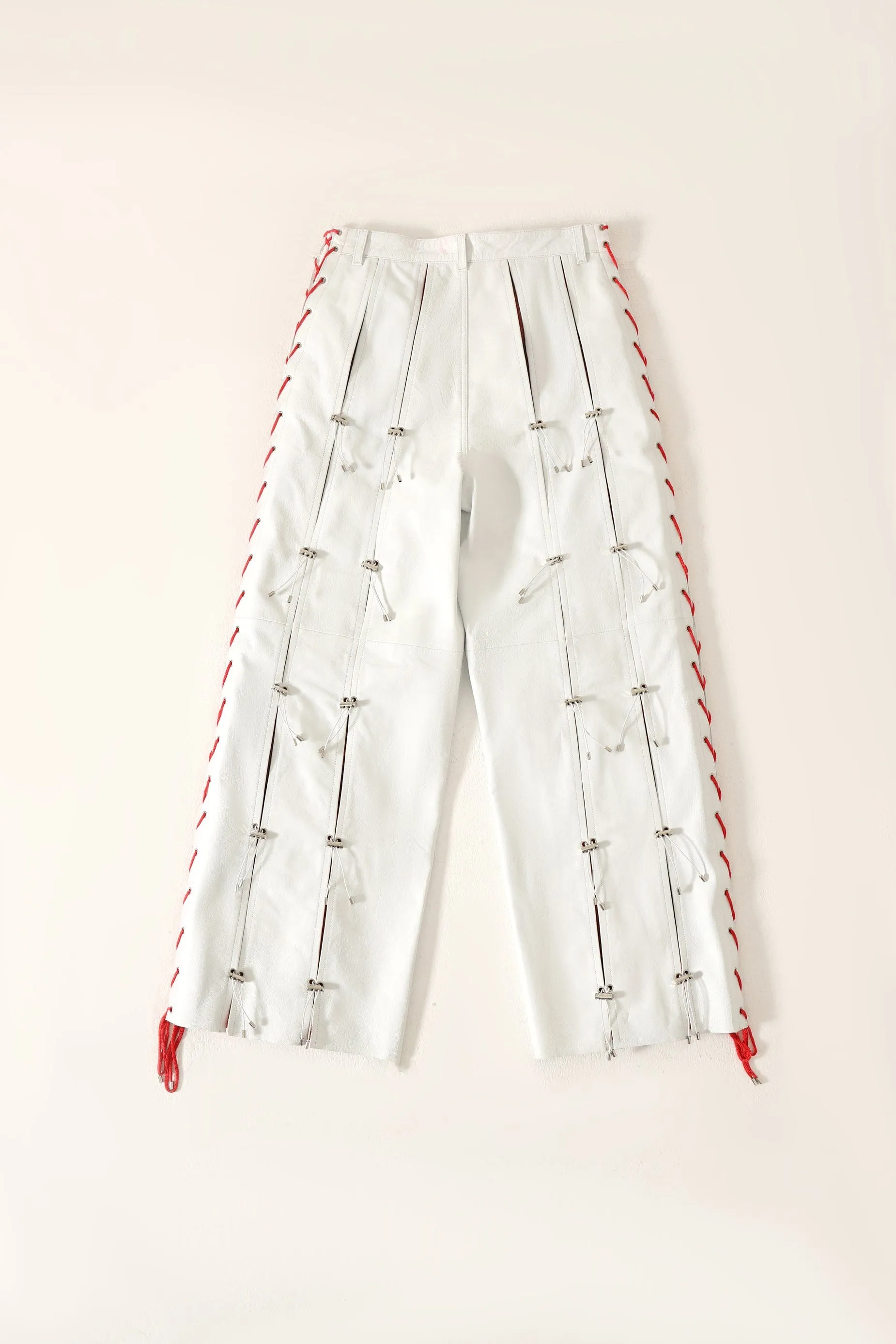 PLEATED LEATHER TROUSERS