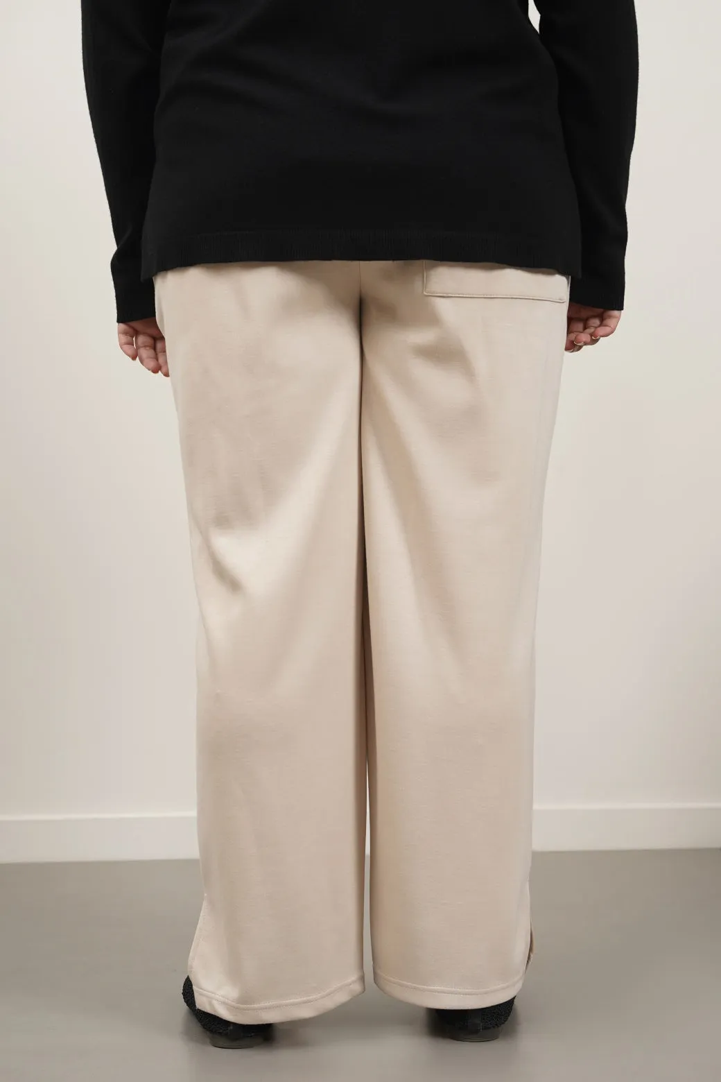 PLEATED NEOPRENE TROUSERS