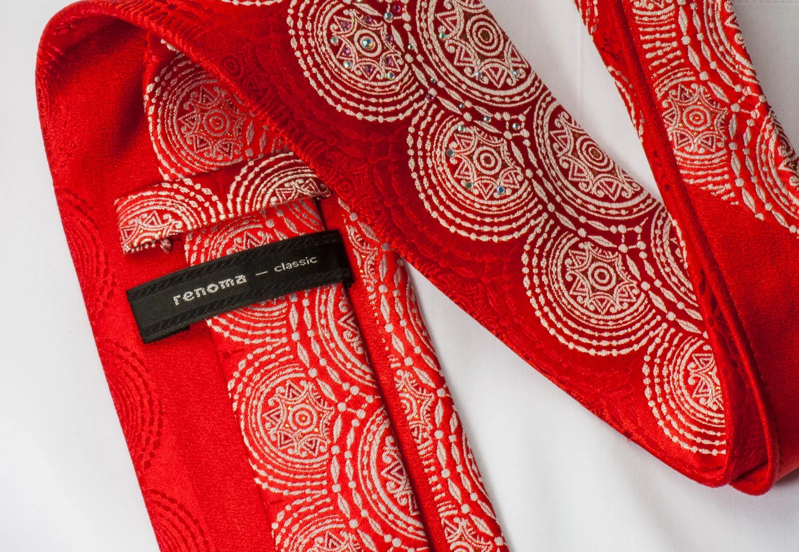 Renoma Men's Silk Neck Tie White Medallions On Red With Silver Sparkles