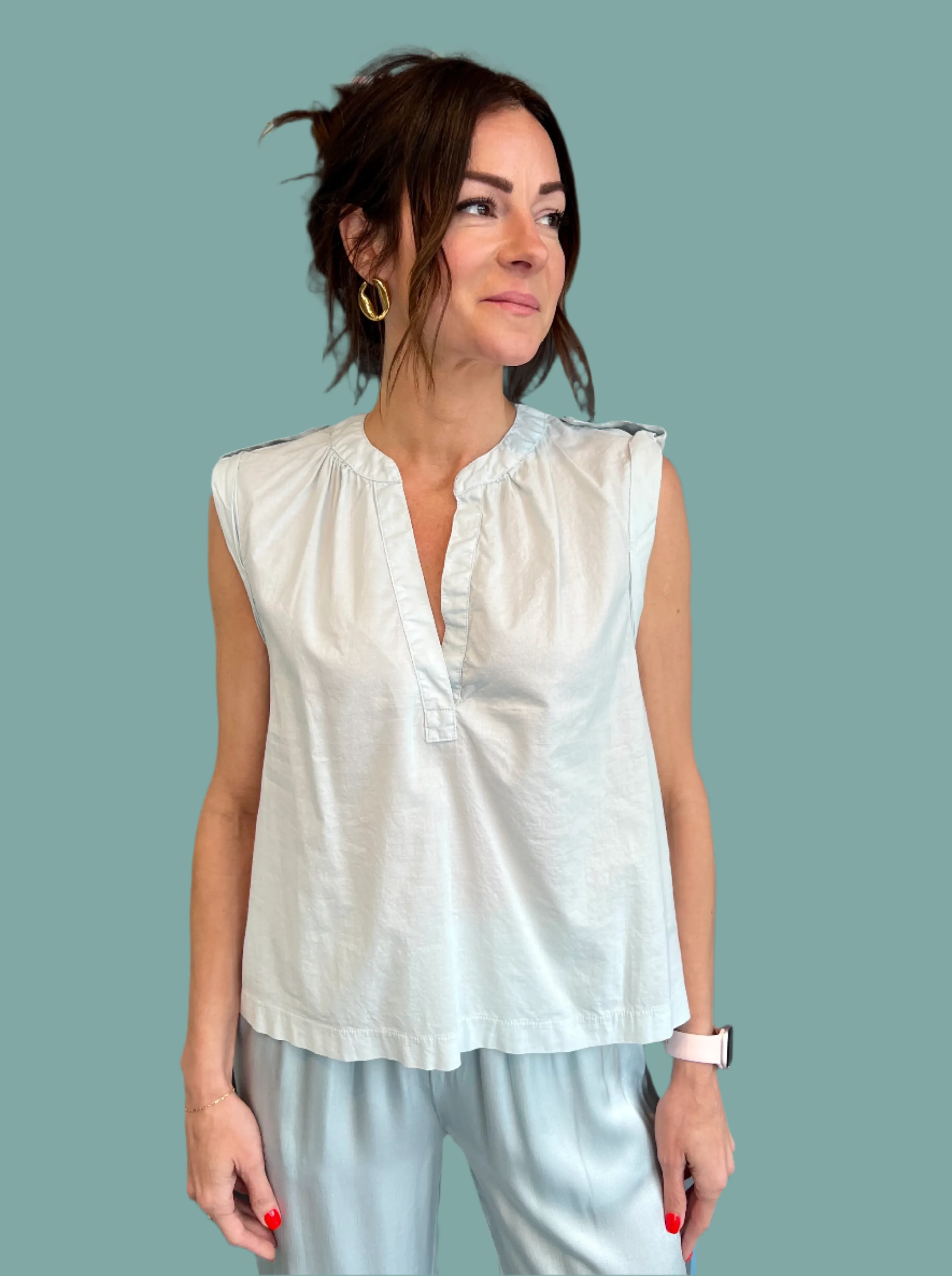 low - torque Bonded Seam Technology Split Neck Tab Sleeveless Top