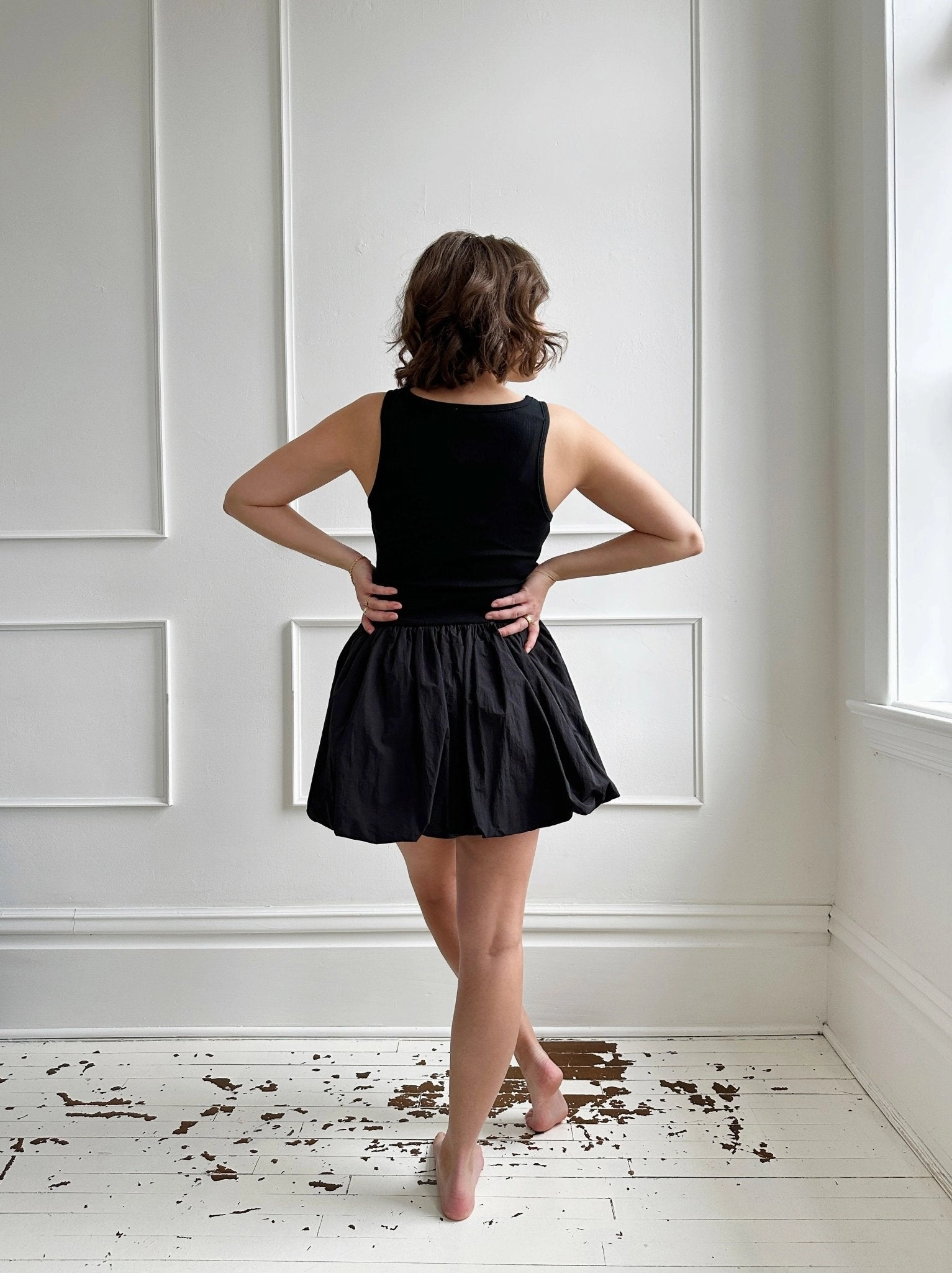 Minimal Curve Bubble Hem Mini Dress